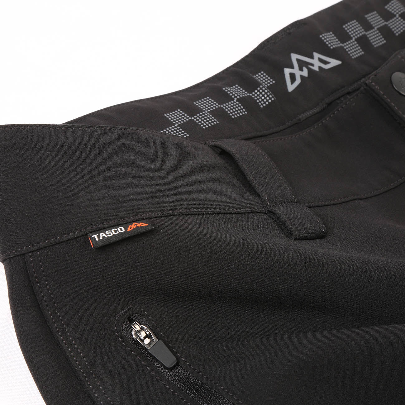 Scout MTB Pants. Detail showing the park pass loop and locking SBS front pocket zipper